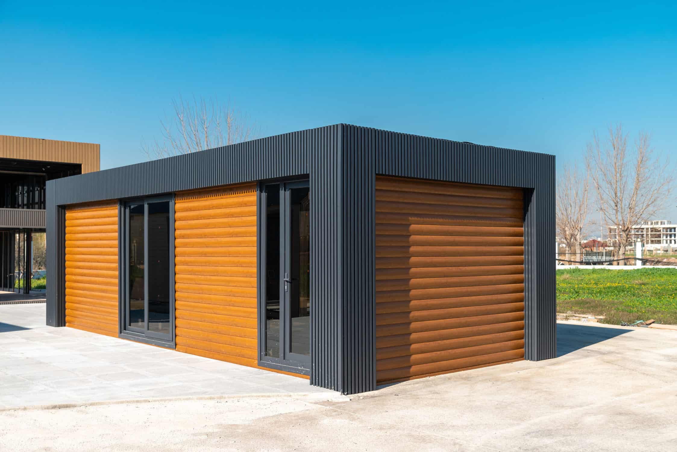 Newly built metal framed building with siding.
